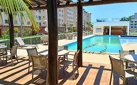 Apartamento aconchegante em condomínio perto da praia